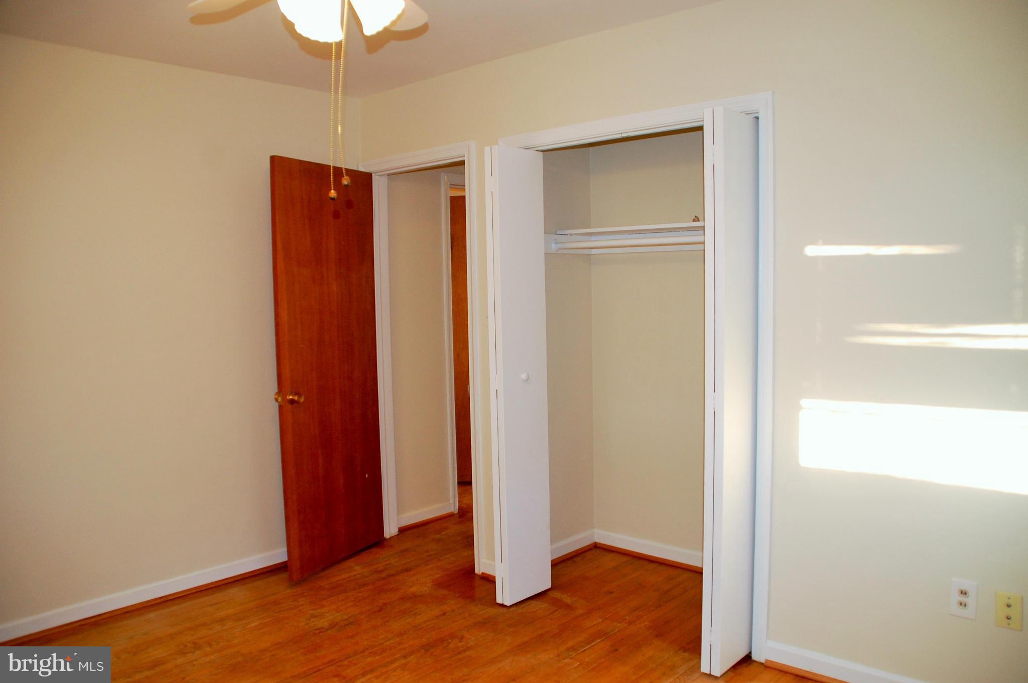 5508 Spruce Drive Clinton, MD 20735 - Photo 12 of 18 a view of entryway with wooden floor
