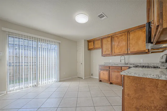 a view of a kitchen with a sink
