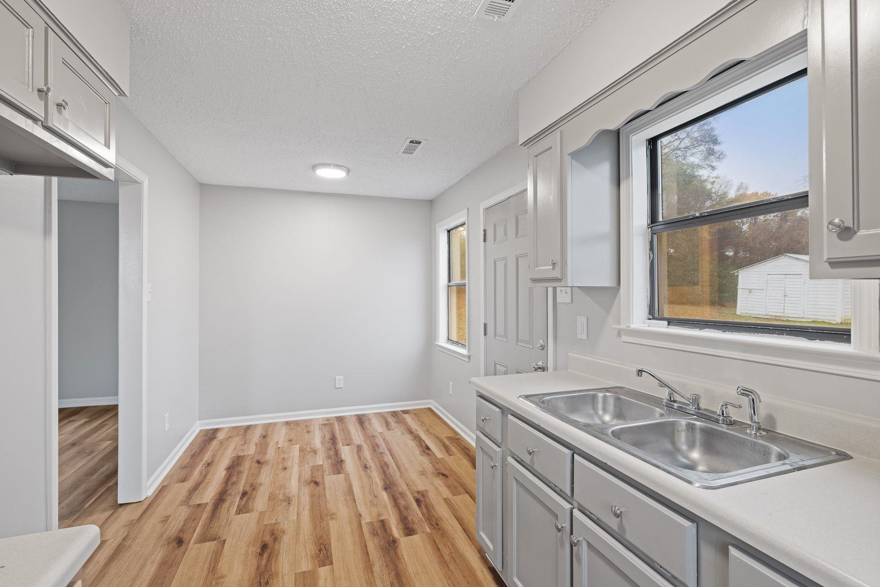 267 Ervin Lane Covington, TN 38019 - Photo 11 of 23 a bathroom with a sink and a window