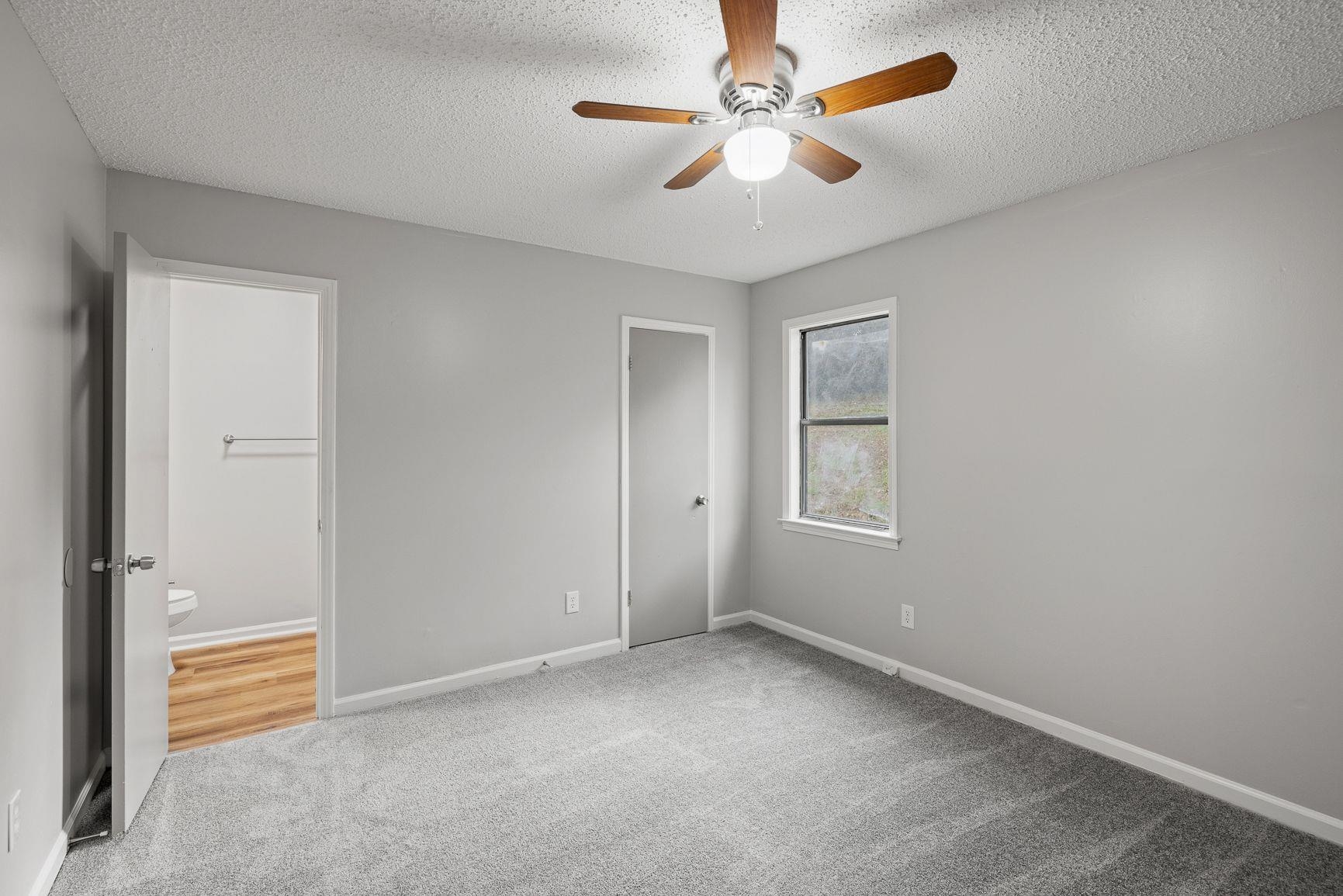 267 Ervin Lane Covington, TN 38019 - Photo 16 of 23 an empty room with closet and a ceiling fan