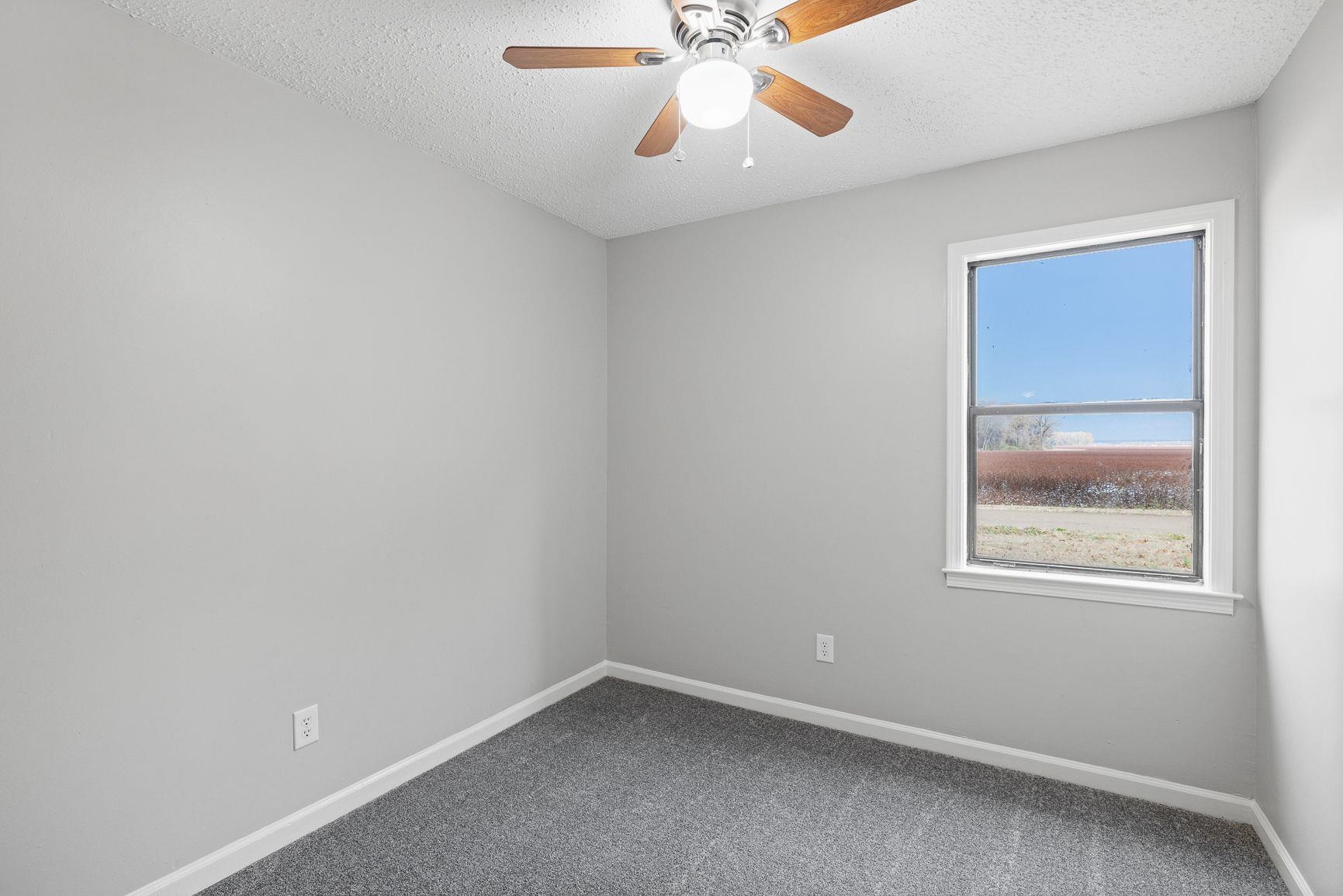 267 Ervin Lane Covington, TN 38019 - Photo 19 of 23 an empty room with a window