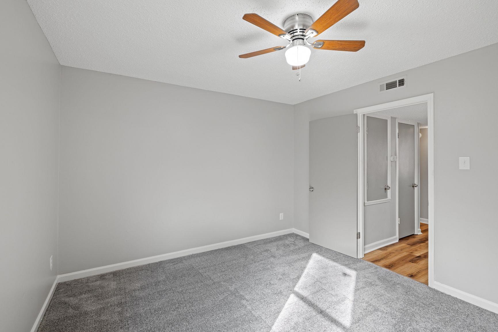 267 Ervin Lane Covington, TN 38019 - Photo 20 of 23 a view of a big room with a chandelier fan