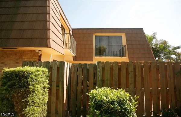 a view of a house with a garden