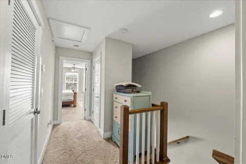 a view of a hallway with washer and dryer