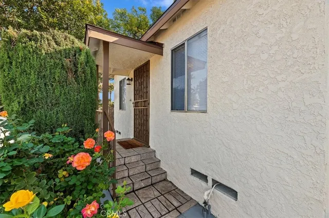 a front view of a house with an outdoor space