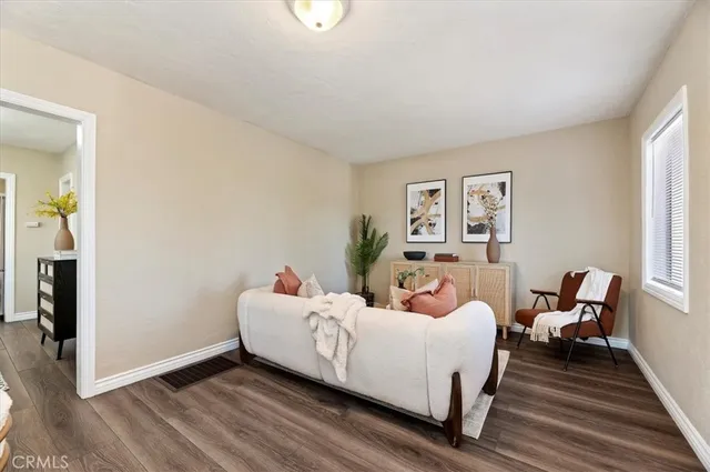 a room with a bed and a chair