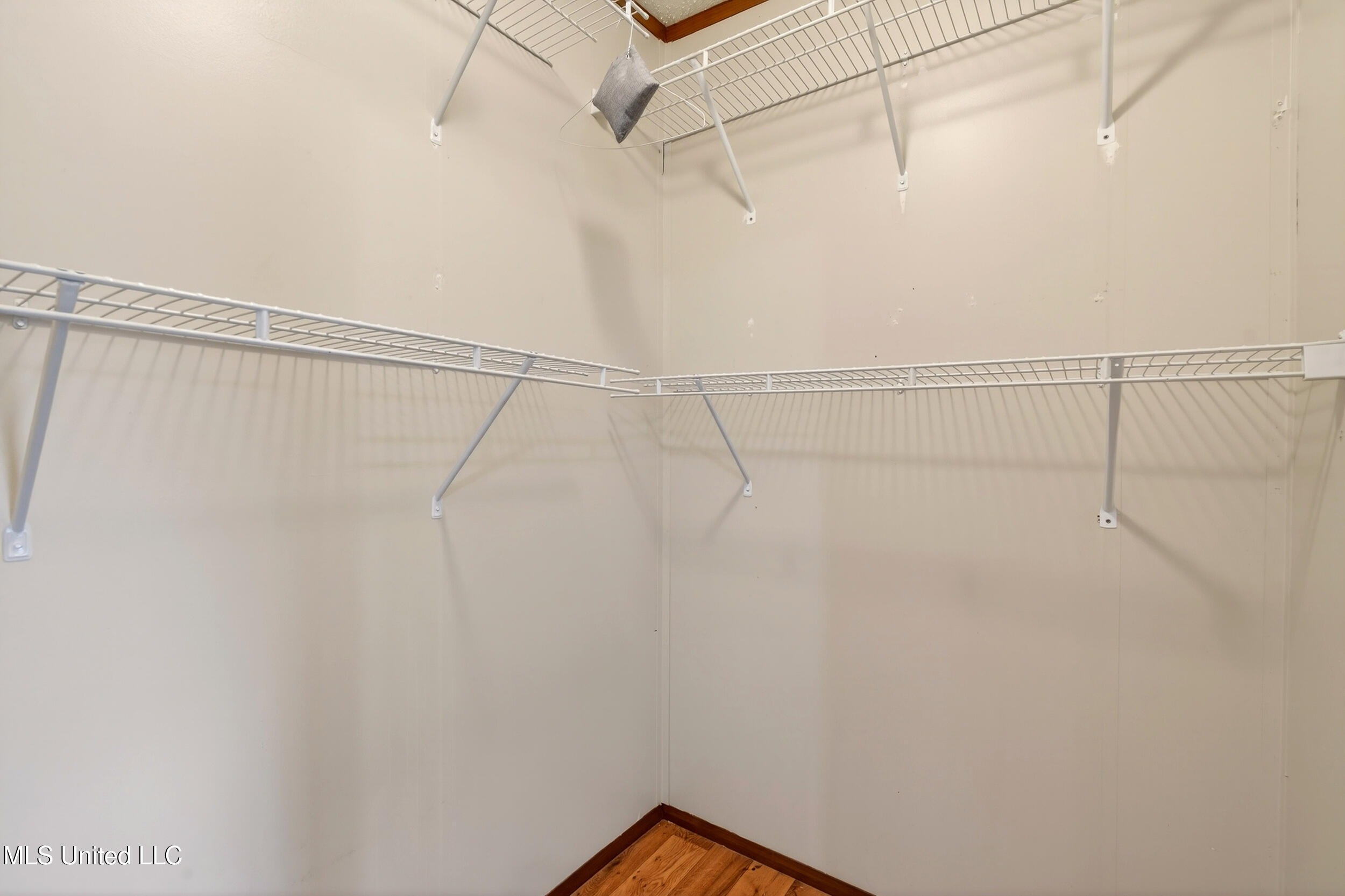 21041 Success Road Saucier, MS 39574 - Photo 29 of 59 29_primary closet 1