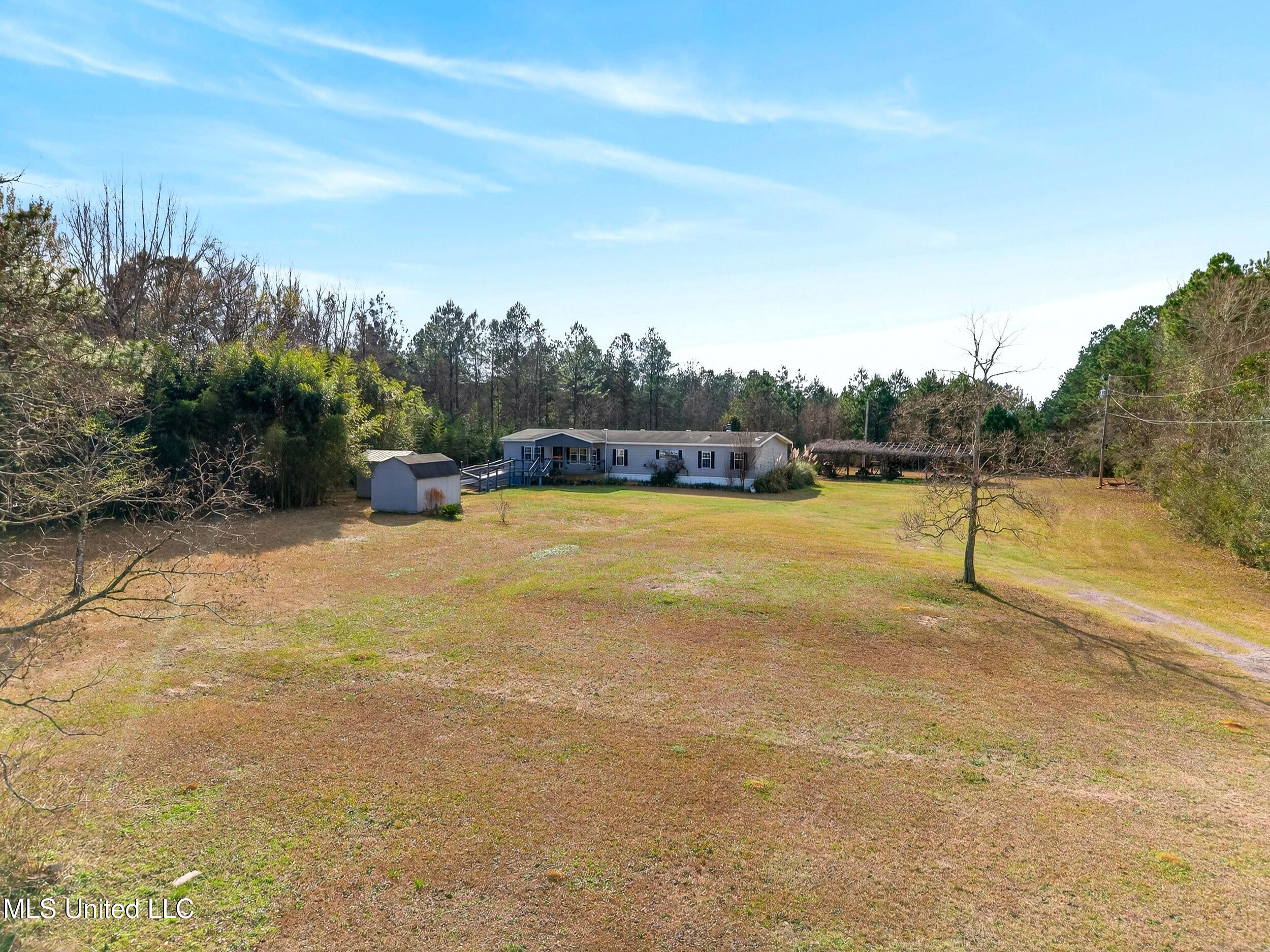 21041 Success Road Saucier, MS 39574 - Photo 51 of 59 51_front yard aerial distant