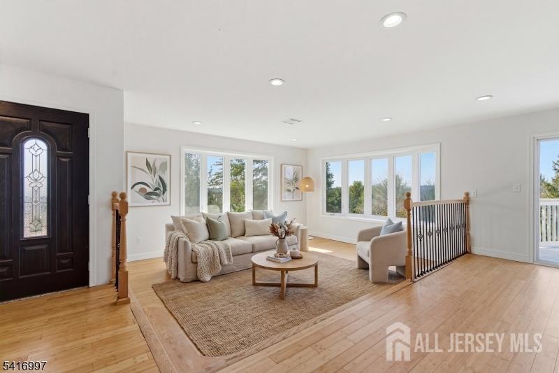 2 Rossi Drive Clinton, NJ 08809 - Photo 12 of 73 a living room with furniture and a window