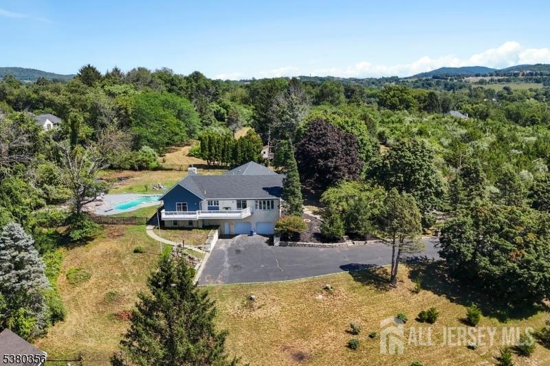 2 Rossi Drive Clinton, NJ 08809 - Photo 43 of 73 an aerial view of a house with a yard