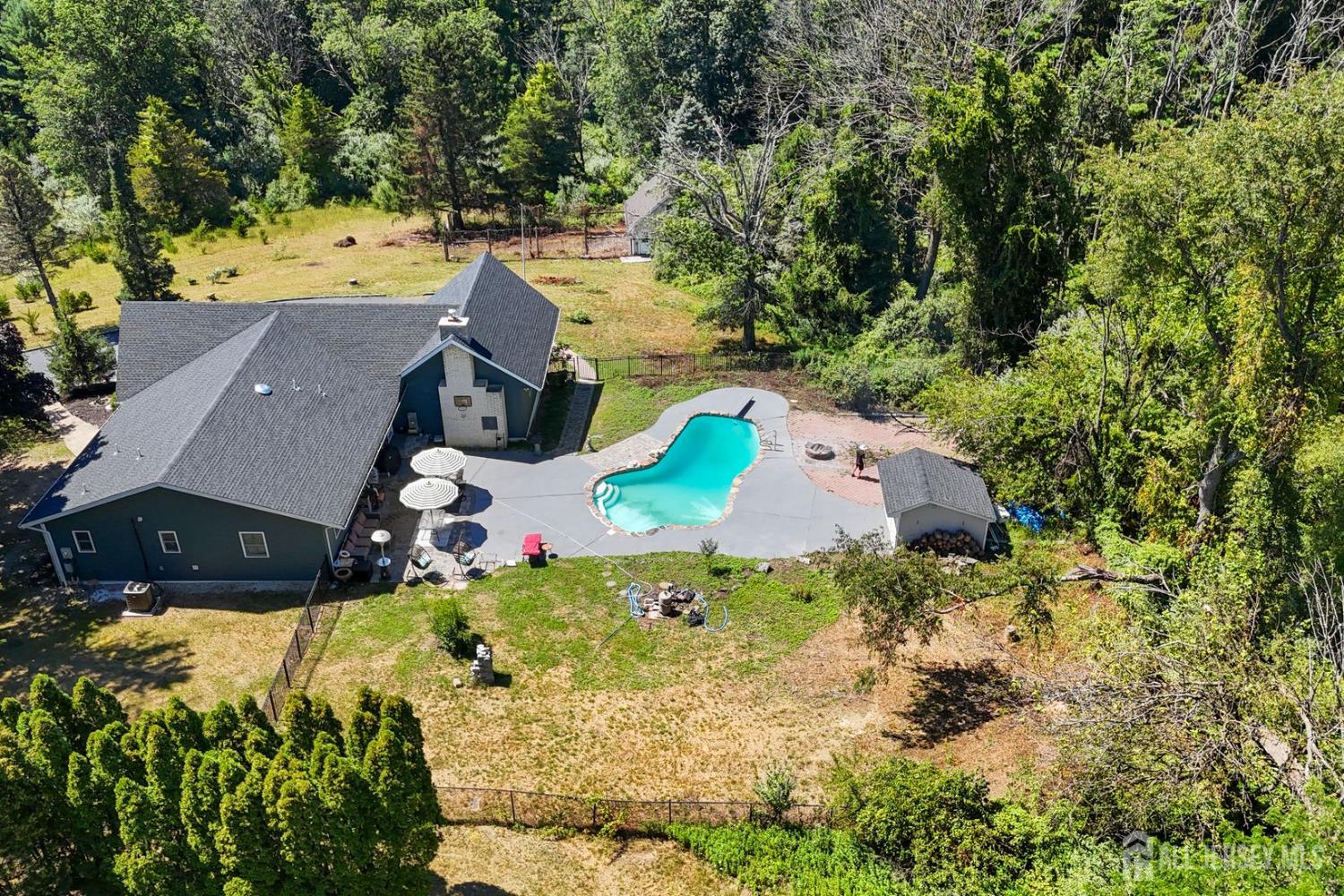 2 Rossi Drive Clinton, NJ 08809 - Photo 50 of 73 an aerial view of a house with a yard