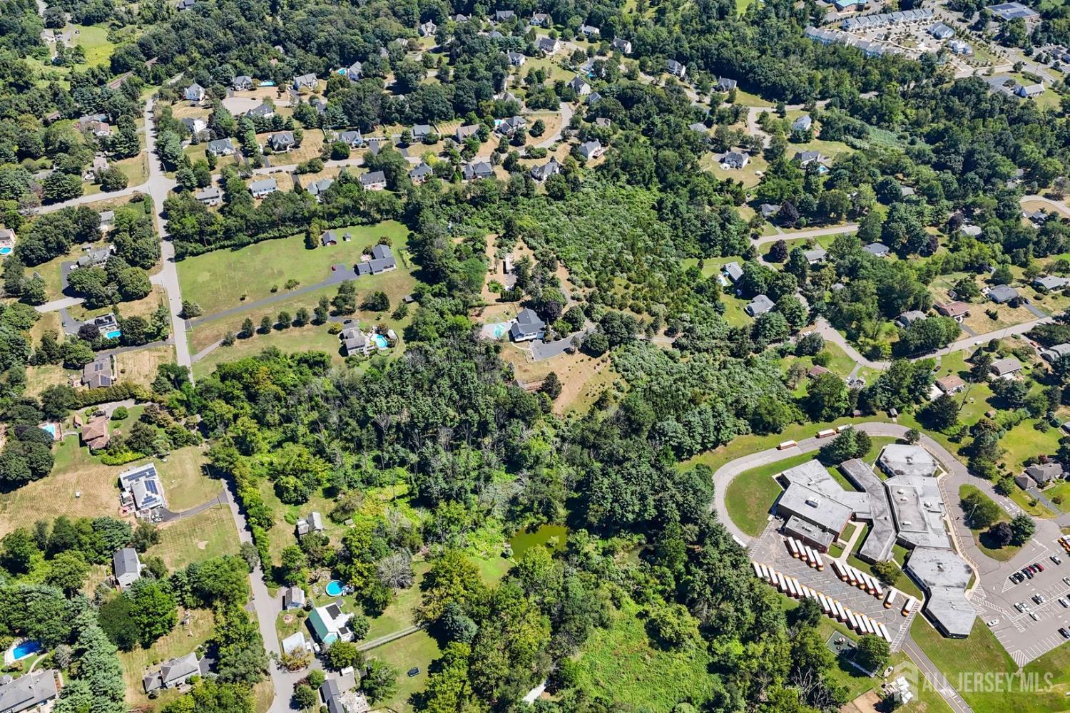 2 Rossi Drive Clinton, NJ 08809 - Photo 56 of 73 an aerial view of a house with a yard