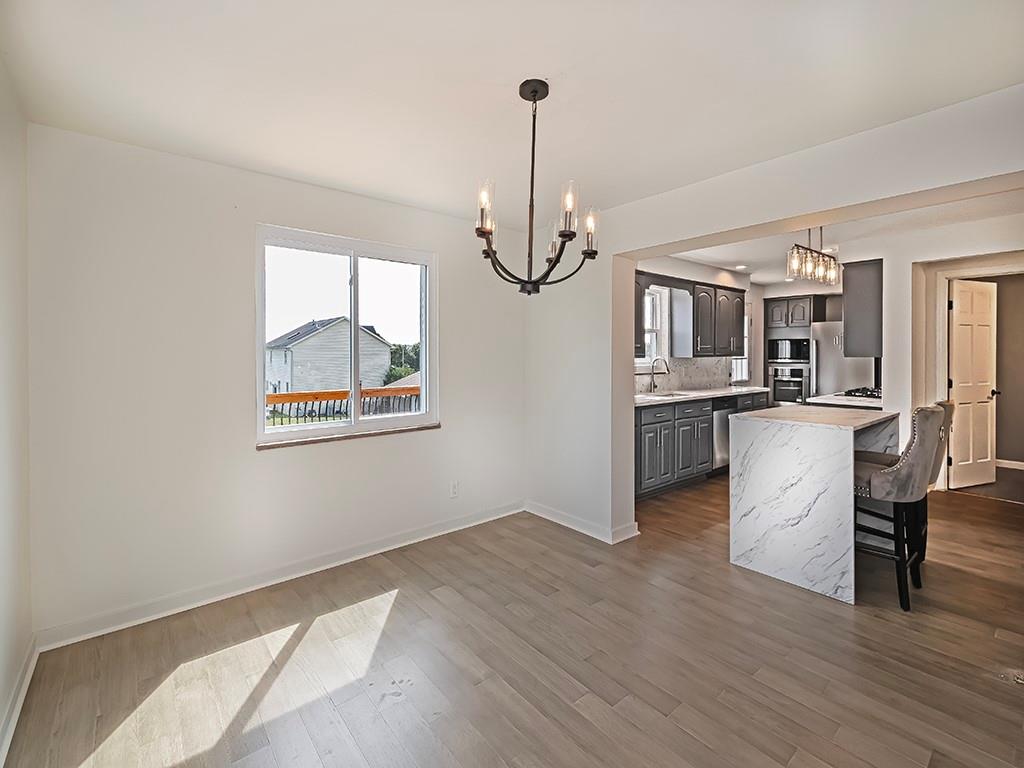 305 Prospect Circle Lower Burrell, PA 15068 - Photo 15 of 29 a view of a kitchen from the hallway