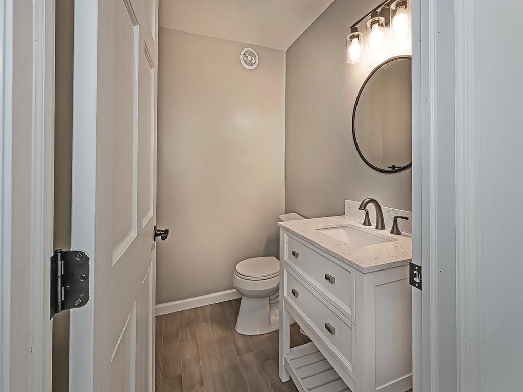 305 Prospect Circle Lower Burrell, PA 15068 - Photo 16 of 29 a bathroom with a toilet sink and mirror