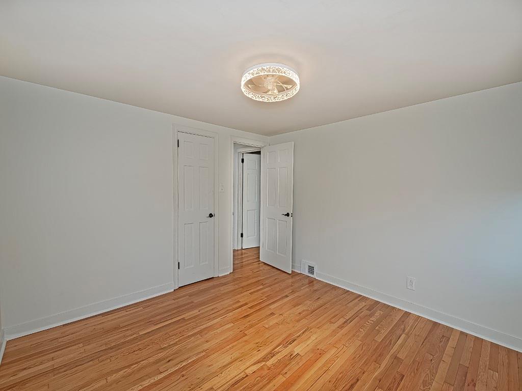 305 Prospect Circle Lower Burrell, PA 15068 - Photo 24 of 29 a view of empty room with wooden floor