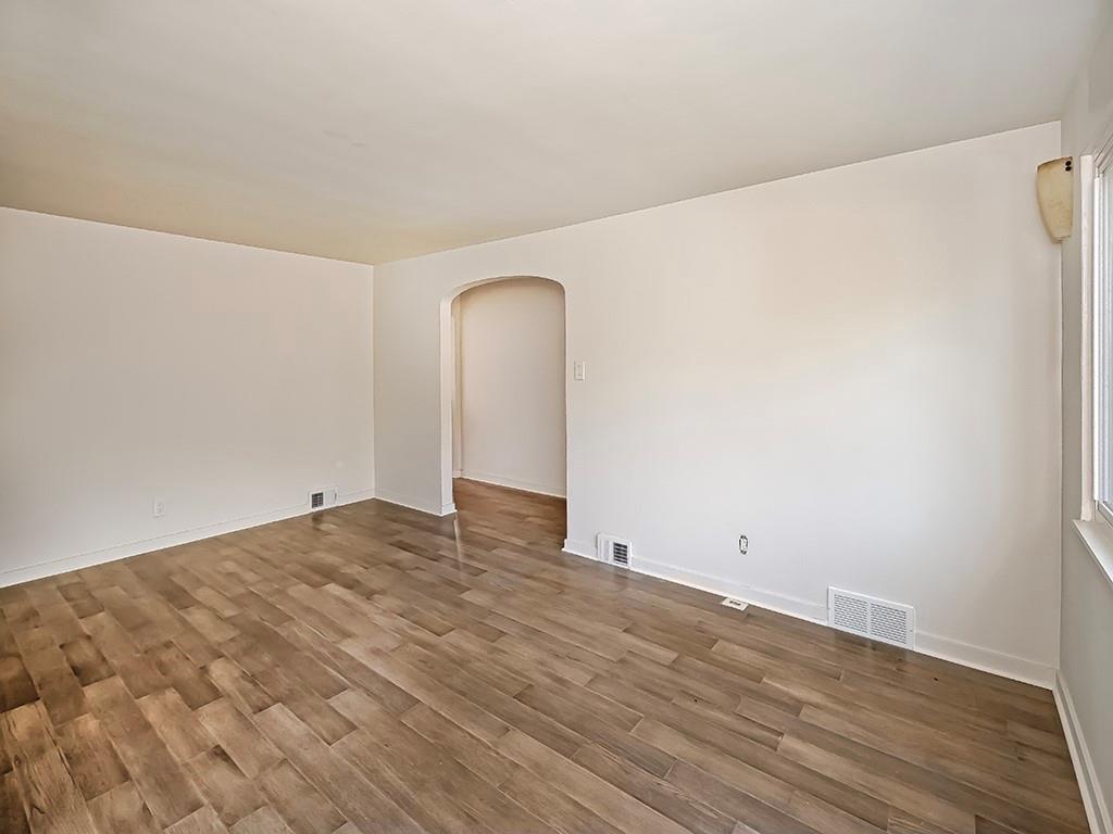305 Prospect Circle Lower Burrell, PA 15068 - Photo 10 of 29 a view of empty room with wooden floor