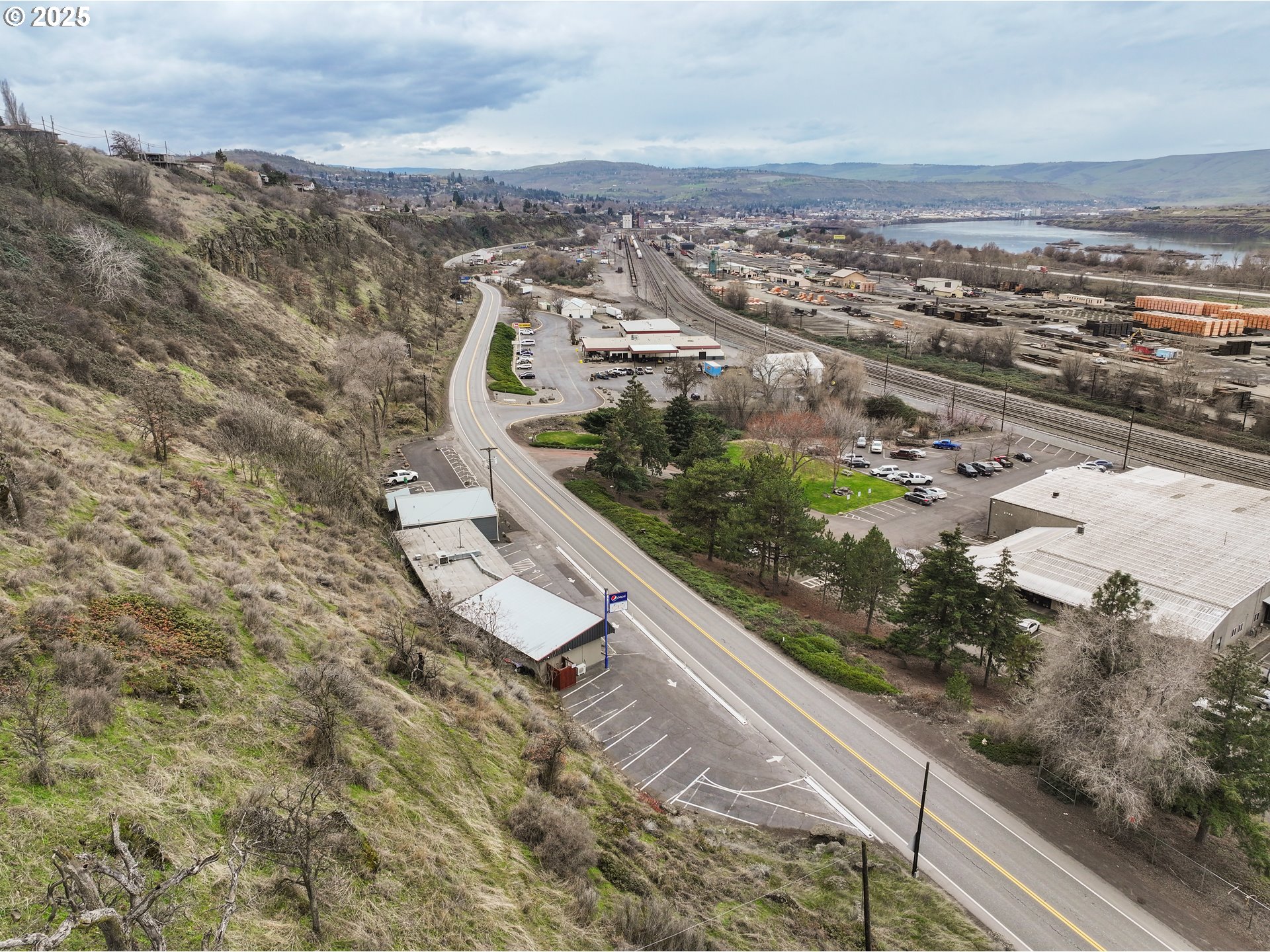 2718 East 2nd Street The Dalles, OR 97058 - Photo 15 of 45 an aerial view of residential houses with outdoor space