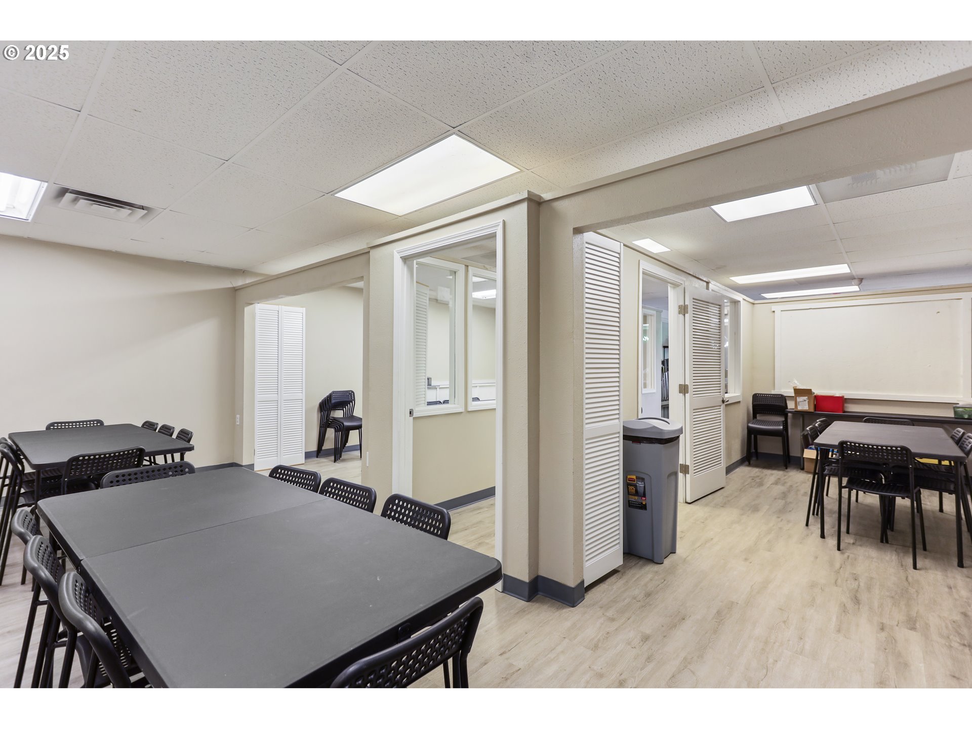 2718 East 2nd Street The Dalles, OR 97058 - Photo 23 of 45 a open kitchen with refrigerator stove dining table and chairs