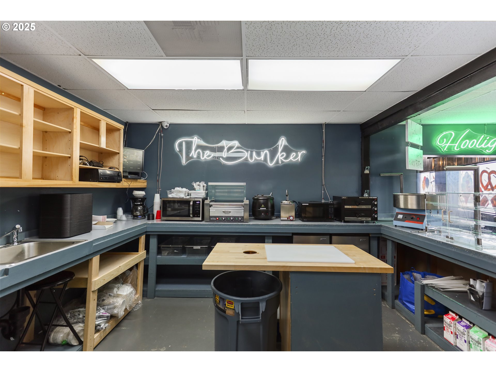 2718 East 2nd Street The Dalles, OR 97058 - Photo 30 of 45 a kitchen with a sink cabinets and window