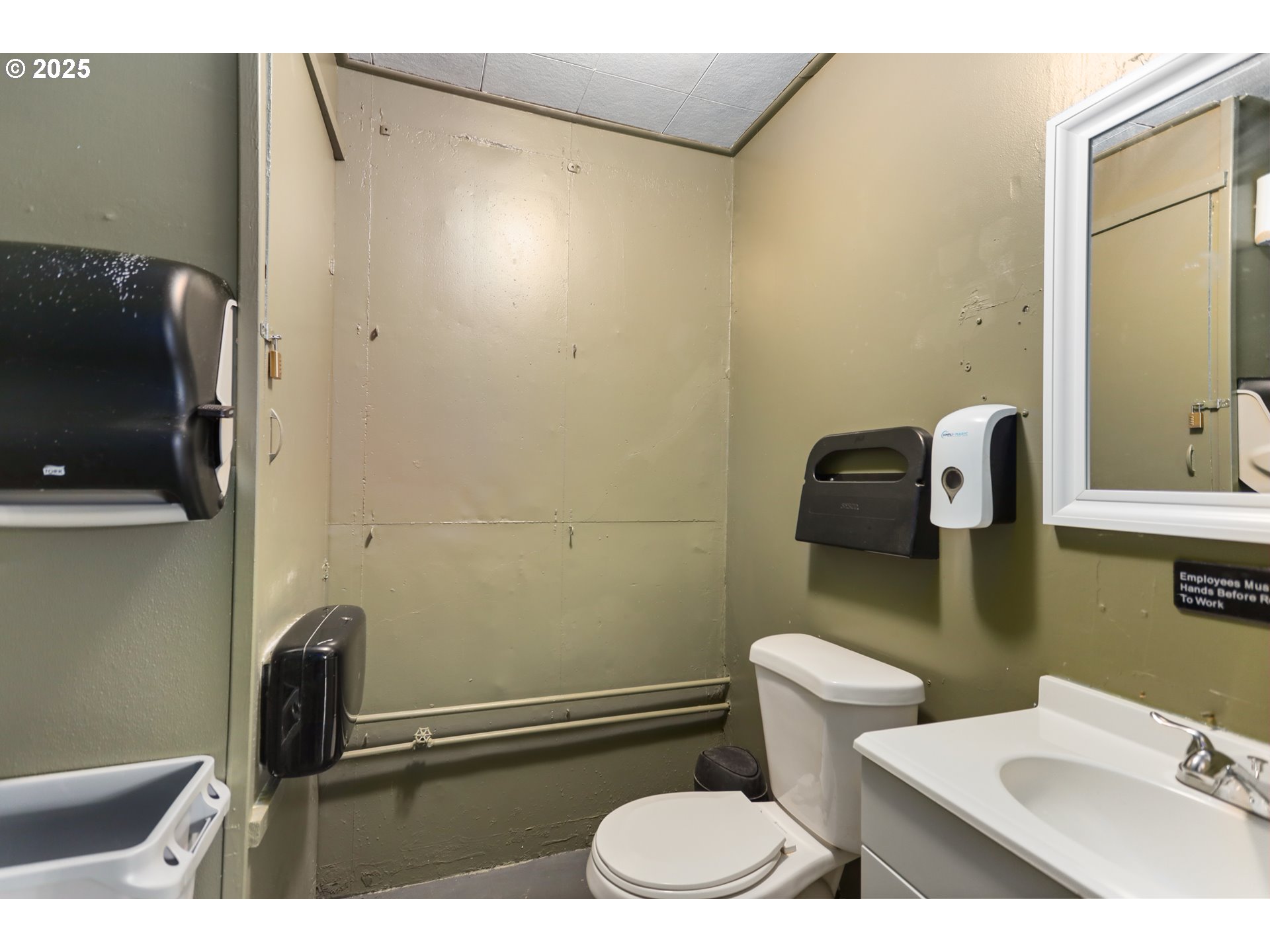 2718 East 2nd Street The Dalles, OR 97058 - Photo 40 of 45 a bathroom with a sink a toilet and mirror