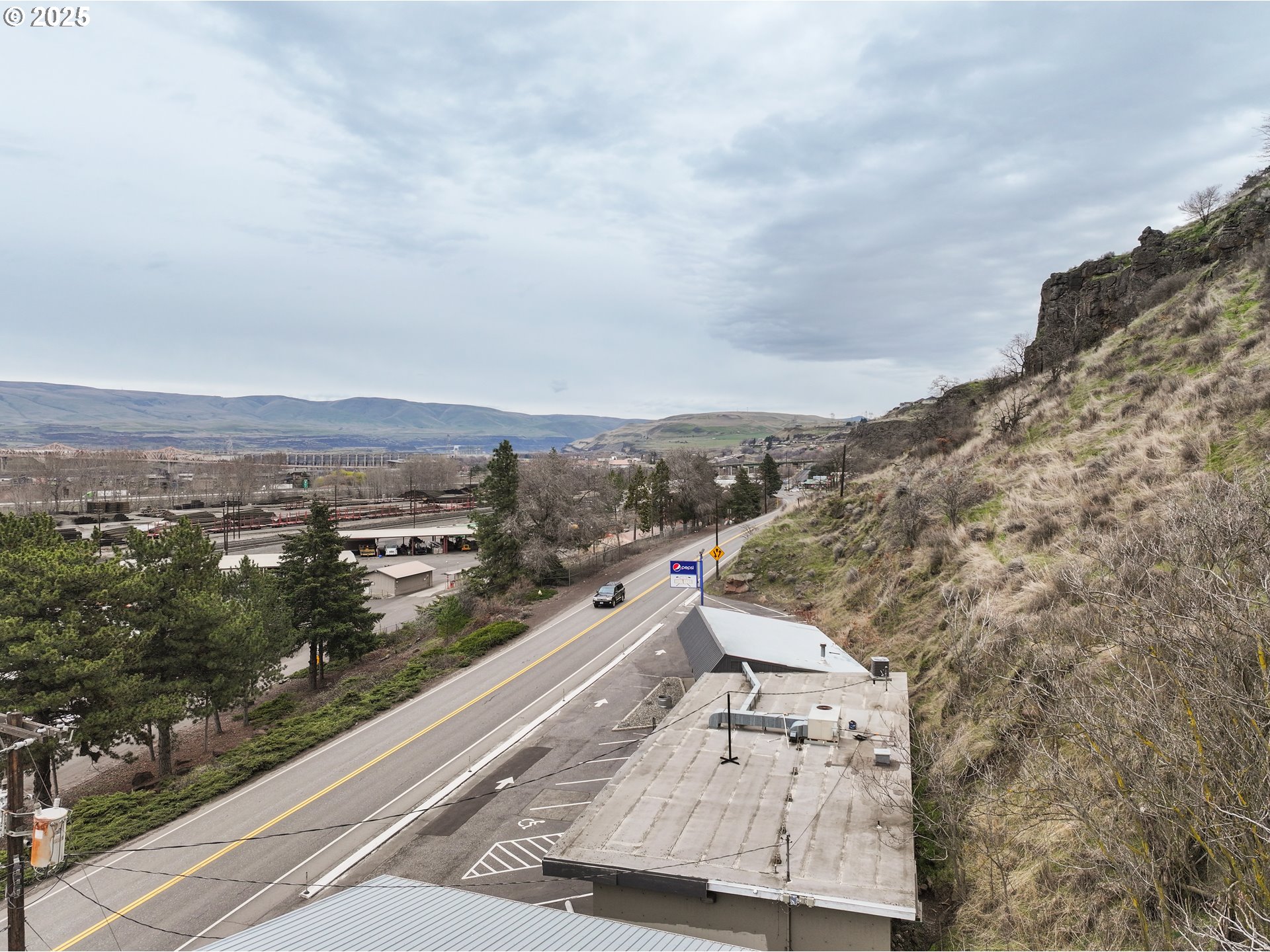 2718 East 2nd Street The Dalles, OR 97058 - Photo 4 of 45 an aerial view of residential houses with outdoor space
