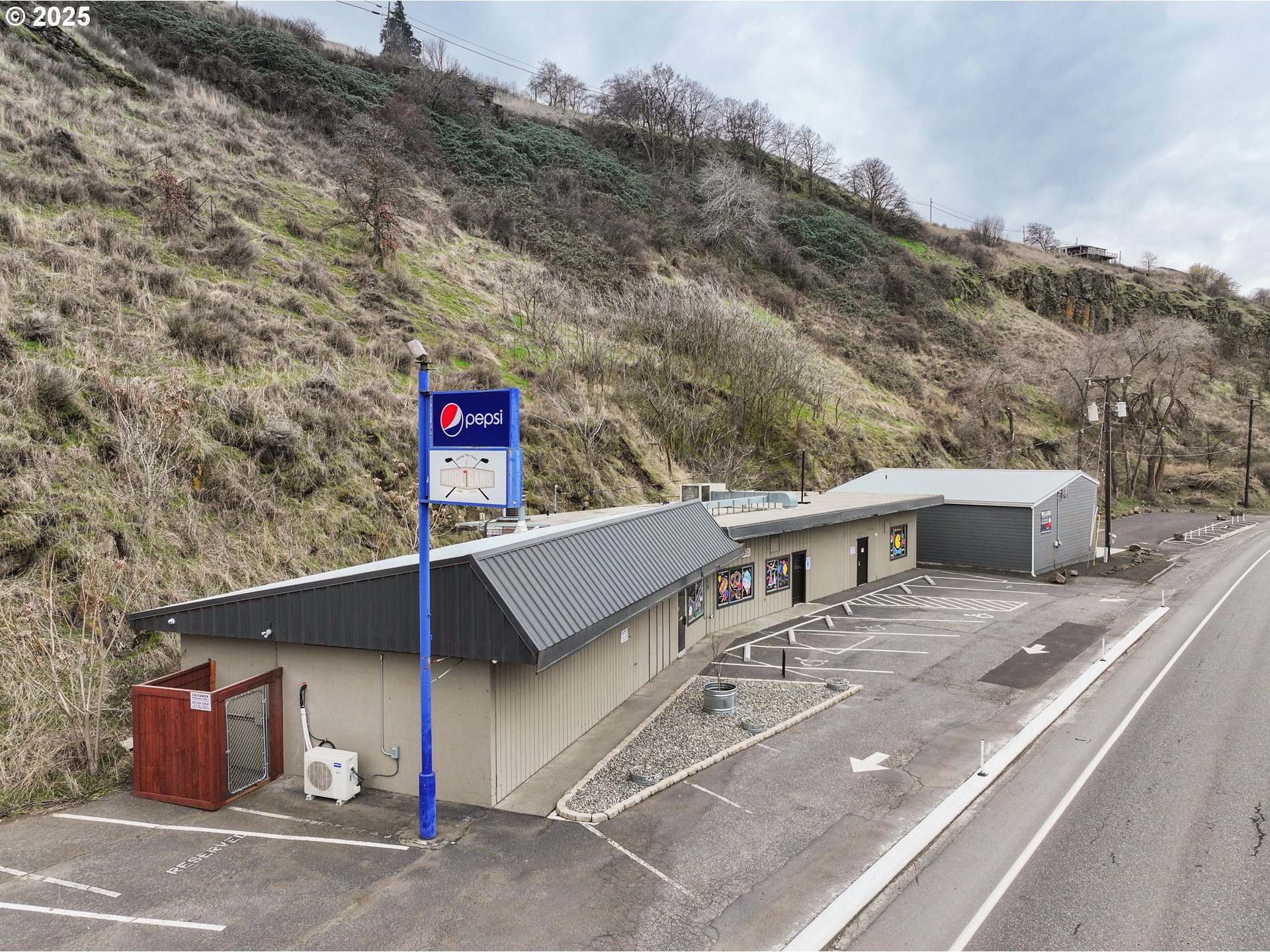 2718 East 2nd Street The Dalles, OR 97058 - Photo 6 of 45 a view of a house with a road from a house