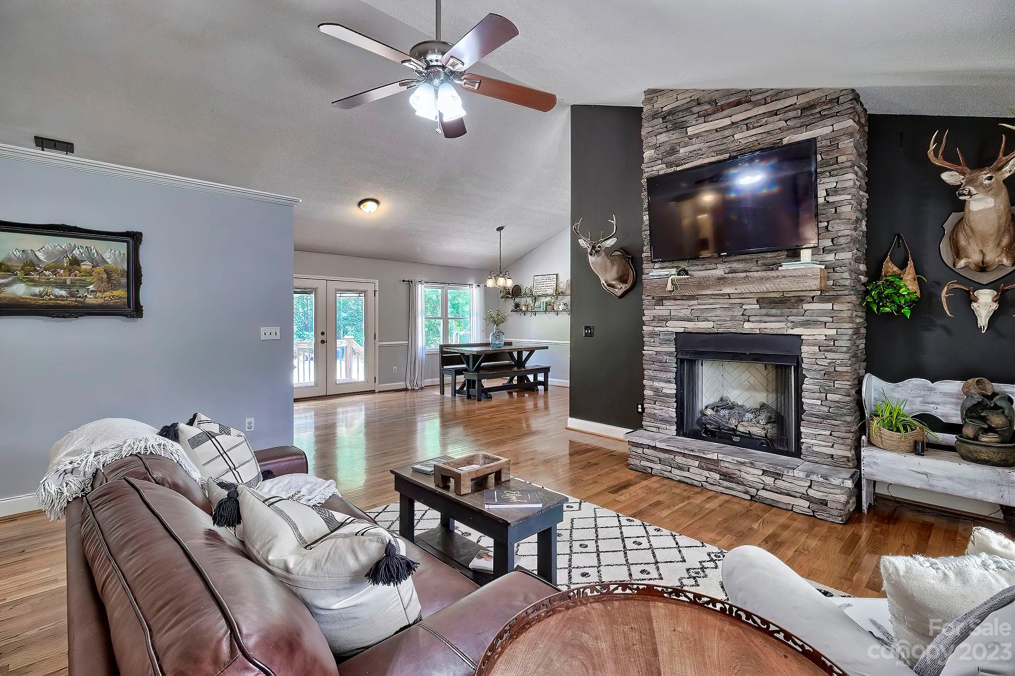 1880 Jones Road Kershaw, SC 29067 - Photo 18 of 33 a living room with furniture fireplace and flat screen tv
