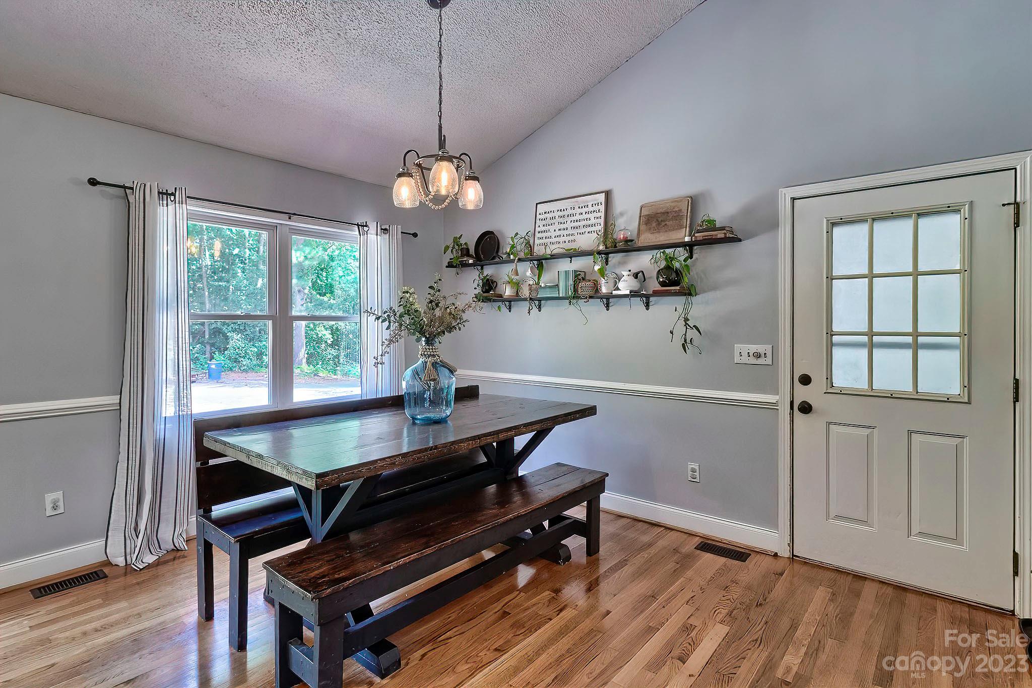 1880 Jones Road Kershaw, SC 29067 - Photo 20 of 33 a room with wooden floor pool table and windows