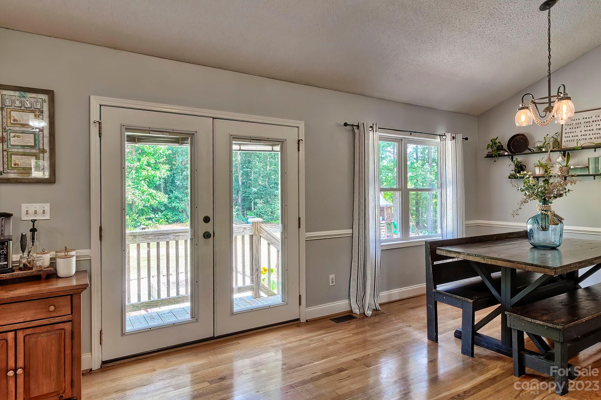 1880 Jones Road Kershaw, SC 29067 - Photo 23 of 33 a view of a dining room with furniture window and wooden floor