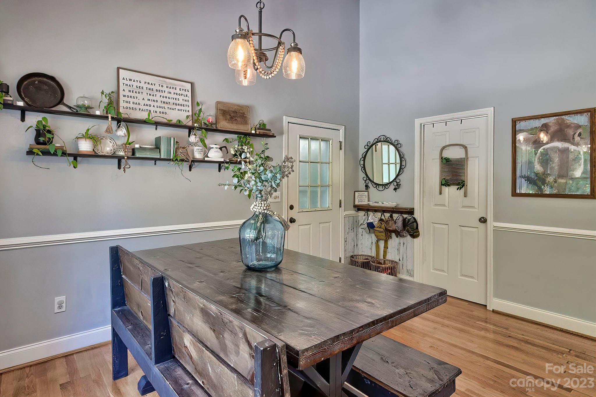 1880 Jones Road Kershaw, SC 29067 - Photo 25 of 33 a view of a dining room with furniture and chandelier