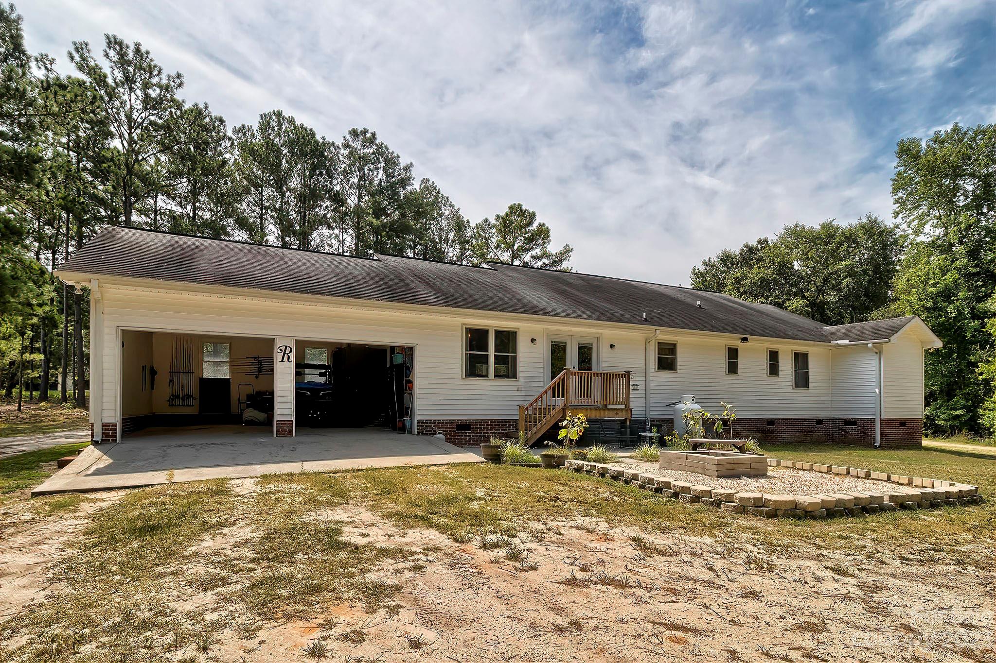 1880 Jones Road Kershaw, SC 29067 - Photo 26 of 33 a house with trees in the background