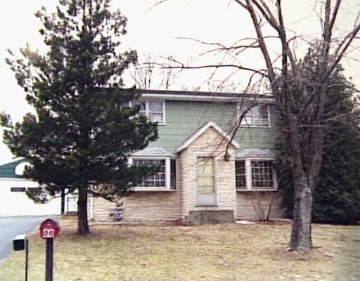 38 Mountain View Road Ansonia, CT 06401 - Photo 1 of 1 a front view of a house with garden