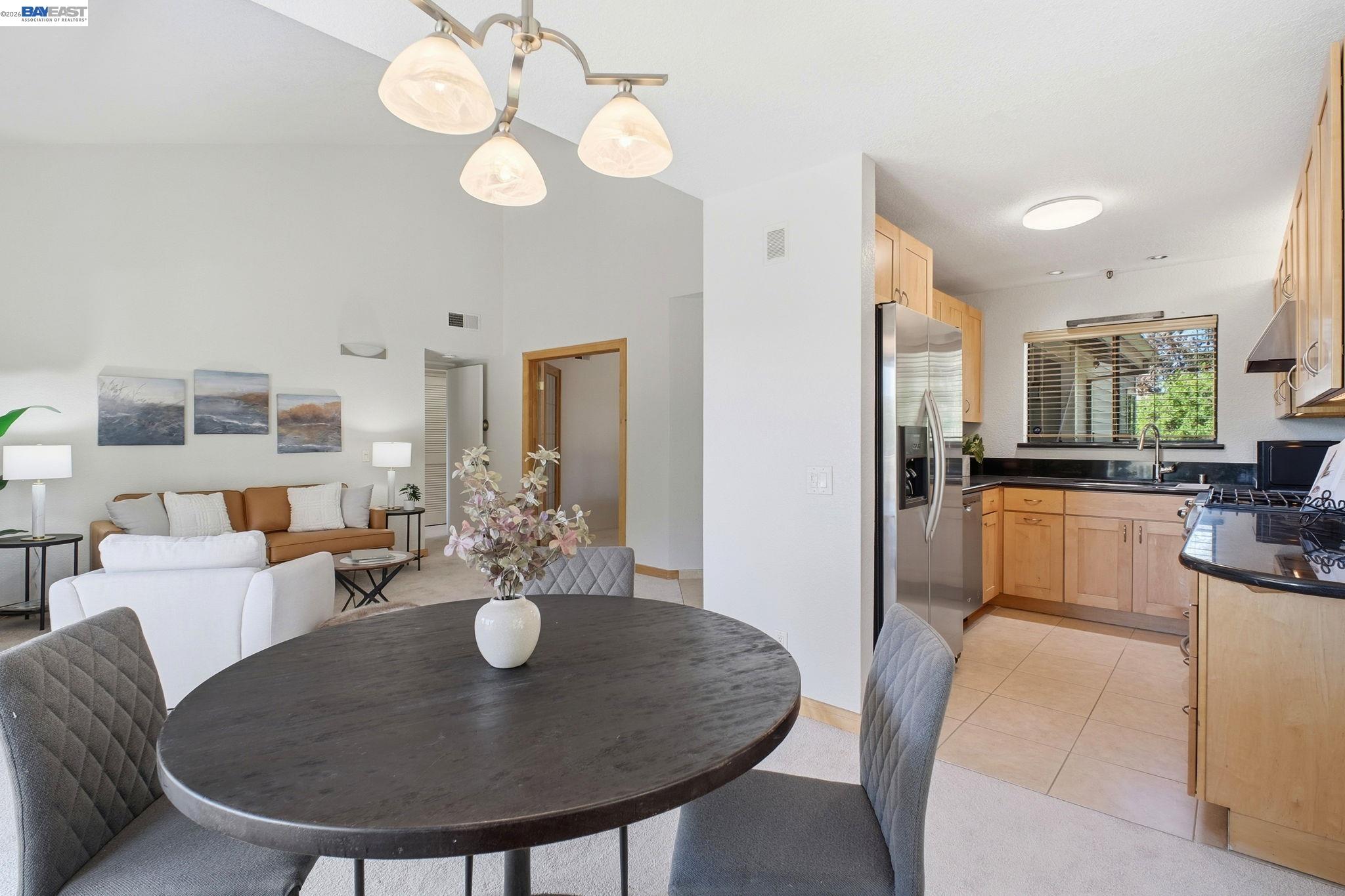 3395 Pinewood Terrace, Unit 304 Fremont, CA 94536 - Photo 13 of 33 a view of a dining room with furniture