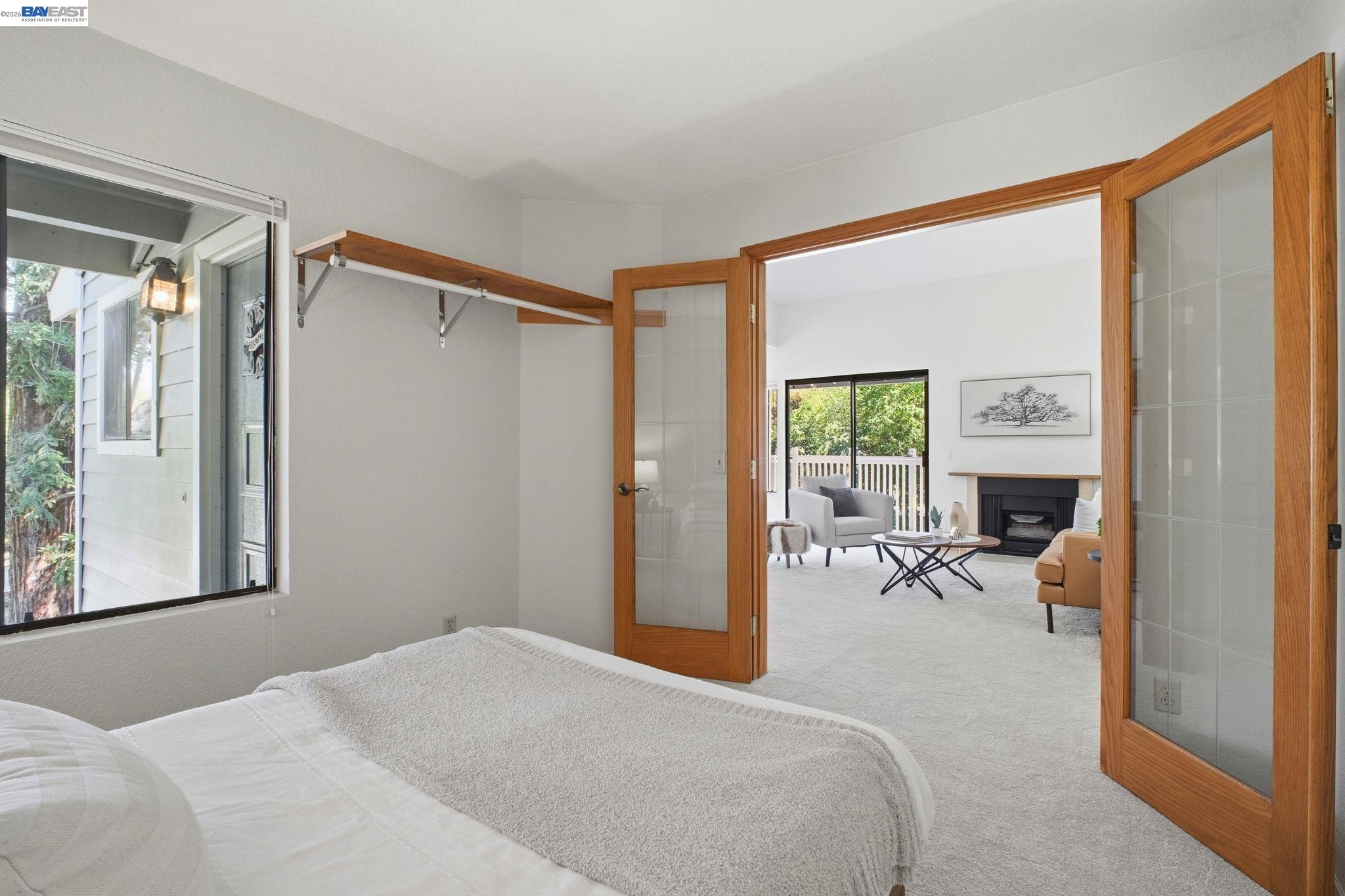 3395 Pinewood Terrace, Unit 304 Fremont, CA 94536 - Photo 18 of 33 a bedroom with furniture and a window