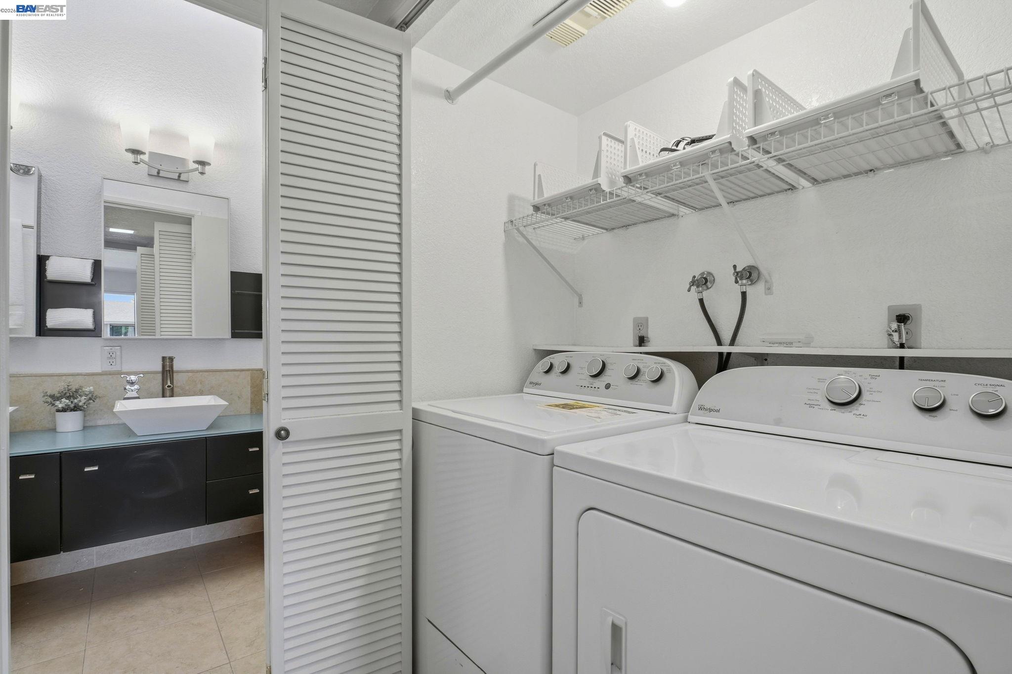 3395 Pinewood Terrace, Unit 304 Fremont, CA 94536 - Photo 26 of 33 a utility room with dryer and washer