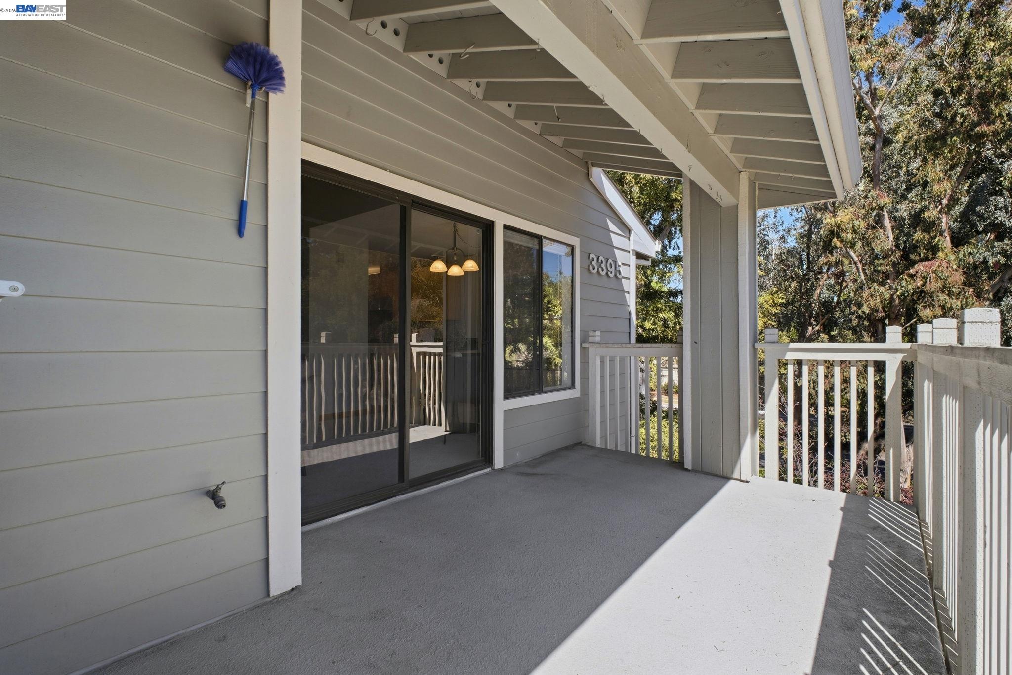 3395 Pinewood Terrace, Unit 304 Fremont, CA 94536 - Photo 29 of 33 a view of a porch with a table and chair