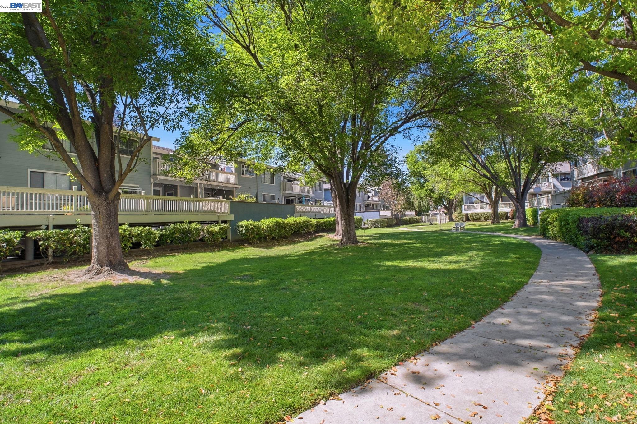 3395 Pinewood Terrace, Unit 304 Fremont, CA 94536 - Photo 32 of 33 a huge green field with lots of trees