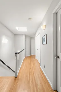 a bed room with a bed and a night stand