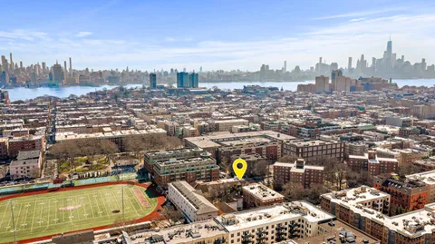 an aerial view of a city with lots of residential buildings