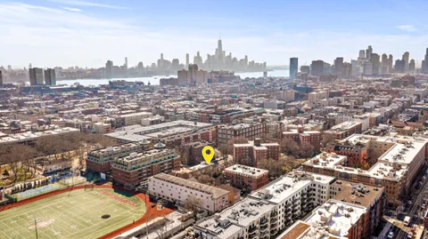 an aerial view of a city with lots of residential buildings