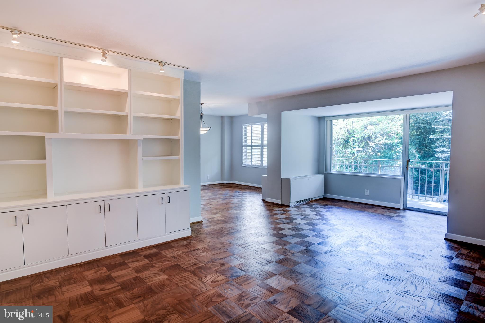 4100 Cathedral Avenue Northwest, Unit 512 Washington, DC 20016 - Photo 13 of 71 a view of an empty room with a window