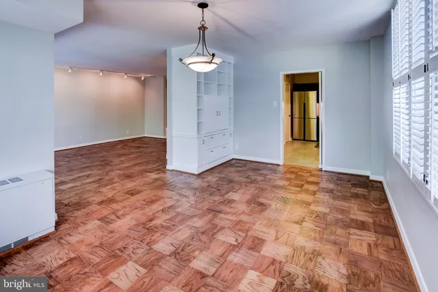 a view of an empty room and window