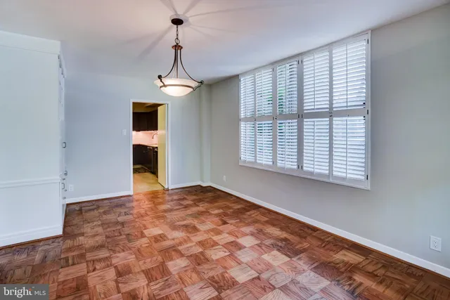 a view of an empty room and window