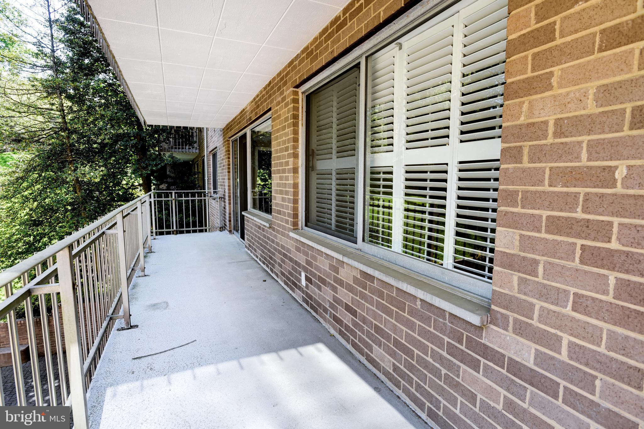 4100 Cathedral Avenue Northwest, Unit 512 Washington, DC 20016 - Photo 28 of 71 a view of a pathway with a balcony