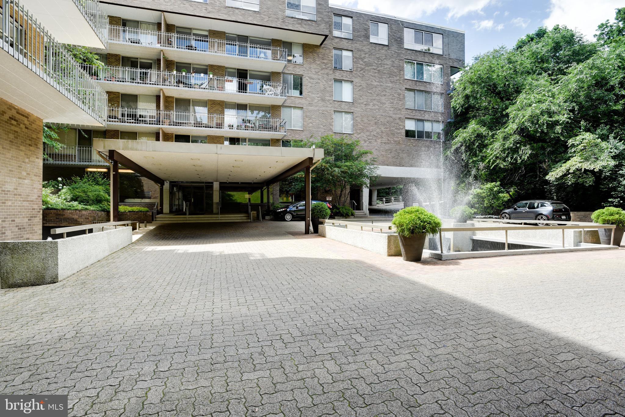 4100 Cathedral Avenue Northwest, Unit 512 Washington, DC 20016 - Photo 48 of 71 a view of a building with sitting area