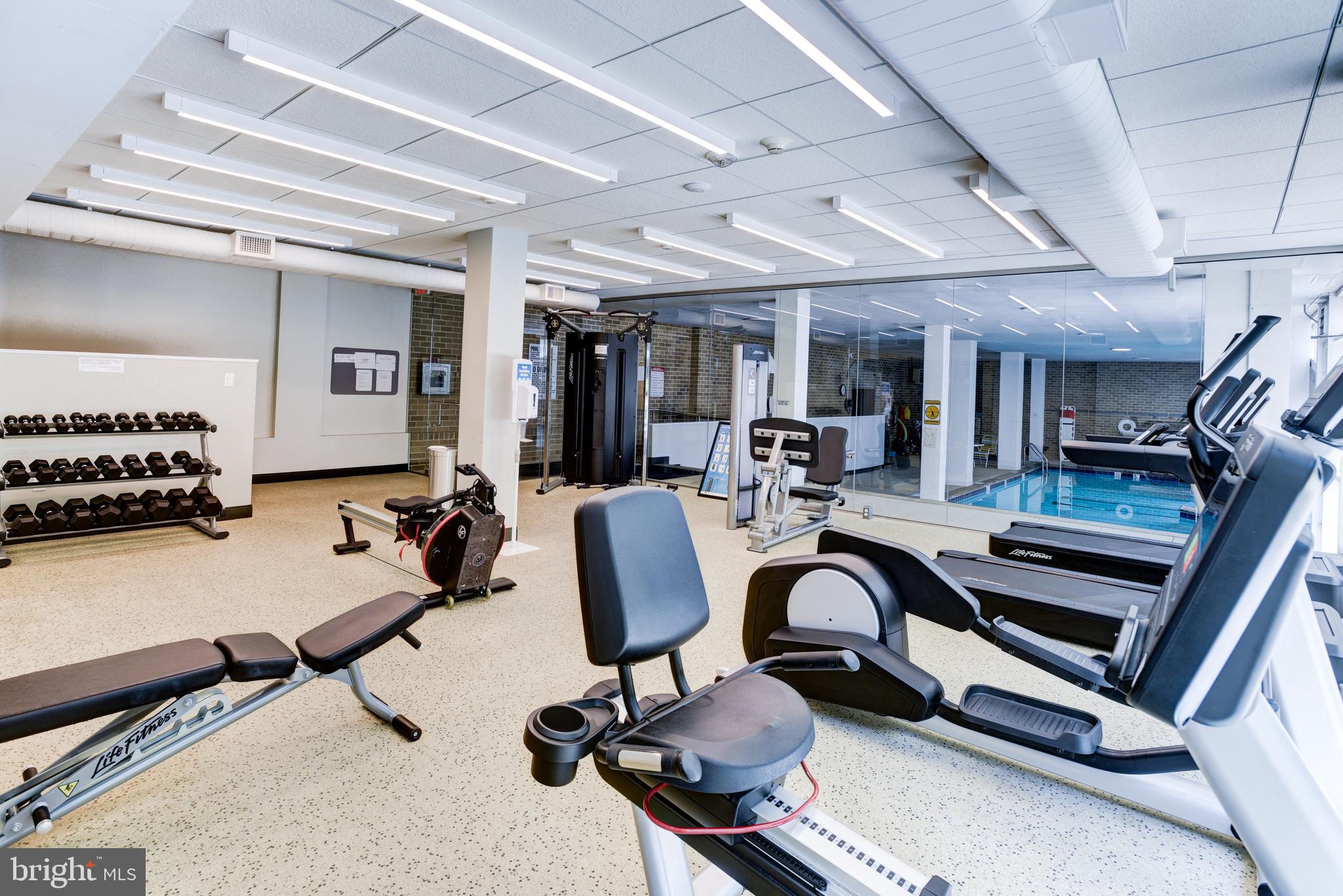 4100 Cathedral Avenue Northwest, Unit 512 Washington, DC 20016 - Photo 60 of 71 a view of a room with gym equipment