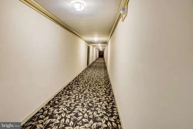 a view of empty room with windows