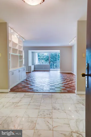 a kitchen with a sink and a stove top oven
