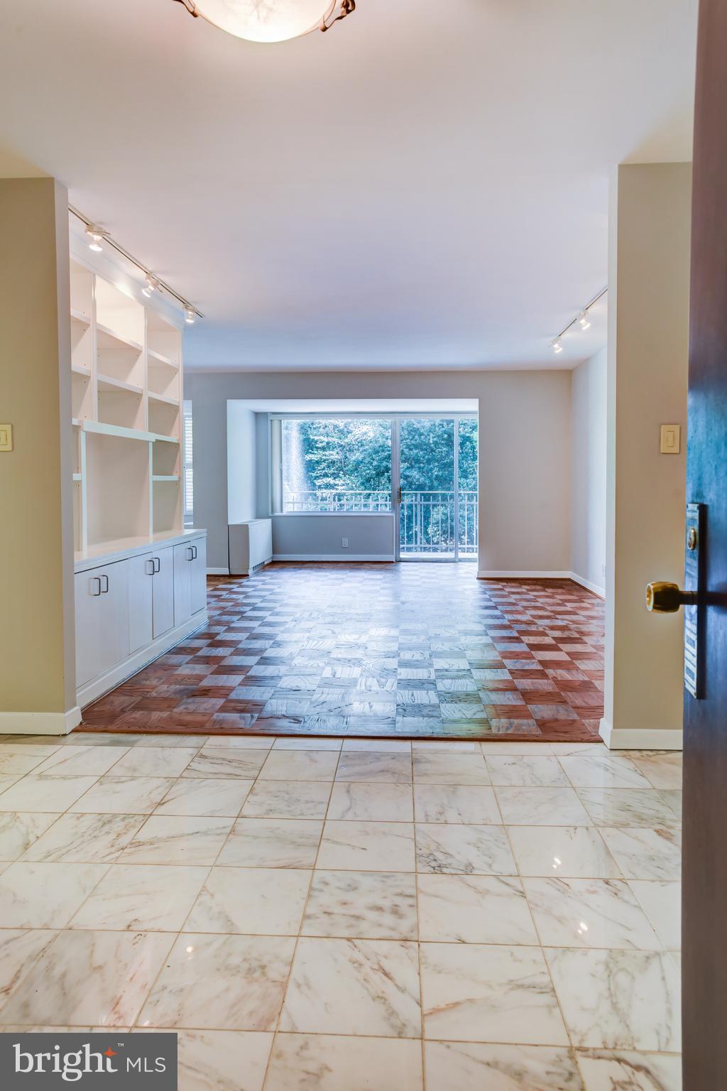 4100 Cathedral Avenue Northwest, Unit 512 Washington, DC 20016 - Photo 10 of 71 a view of empty room with windows