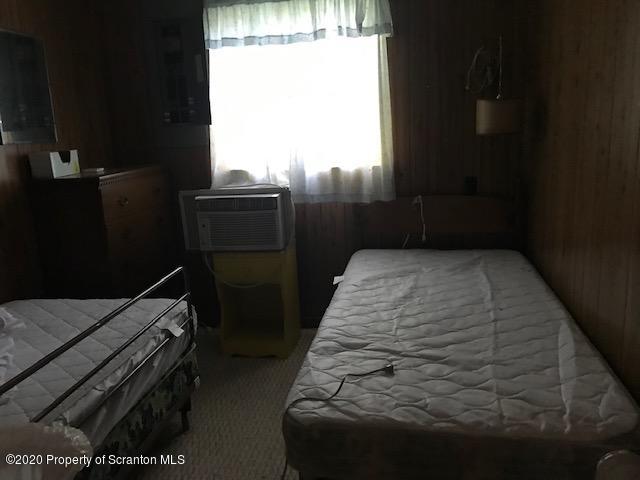 738 Myo Beach Road Meshoppen, PA 18630 - Photo 13 of 14 a bedroom with a bed and a window